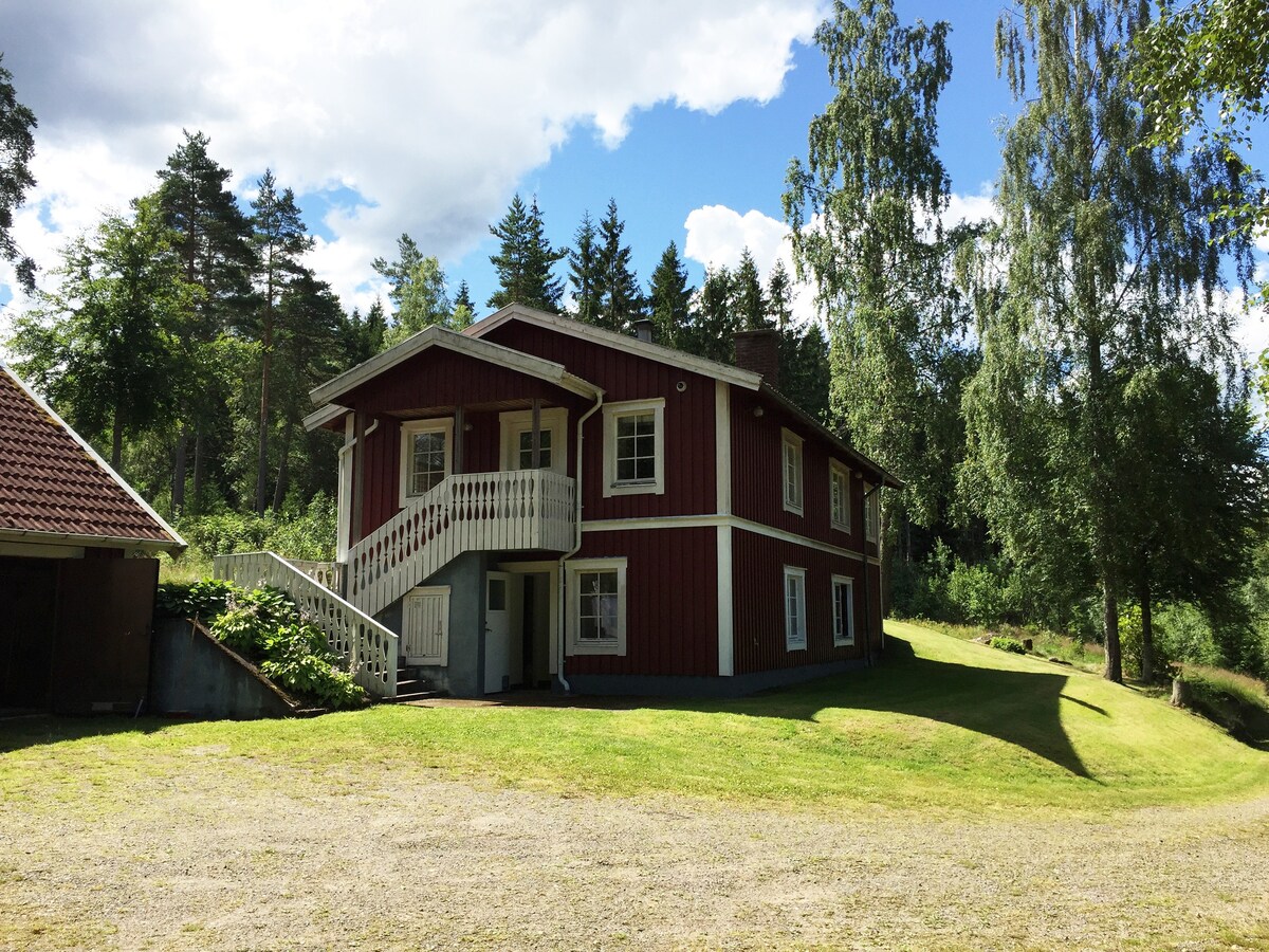 Lovely house on hill next to lake