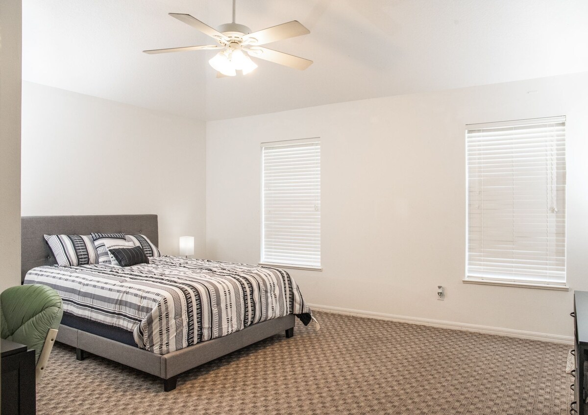 Private master suite with private bathroom.