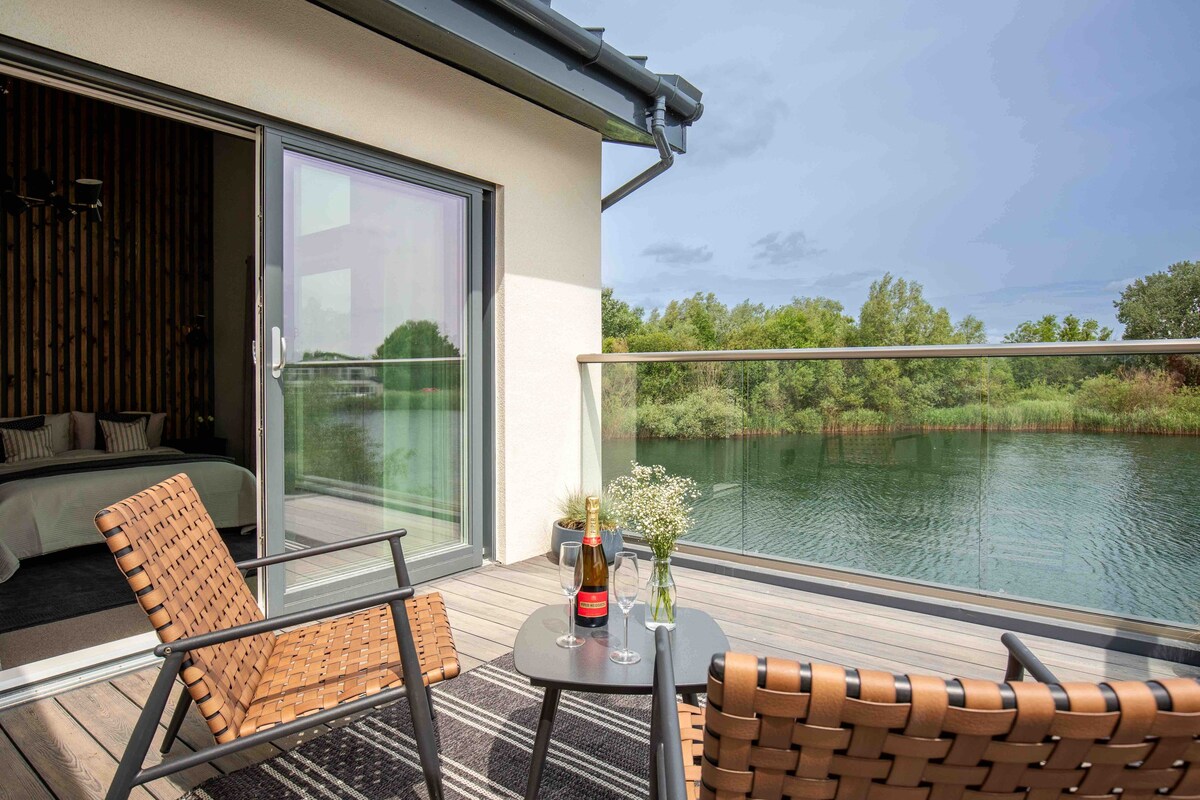 Cotswold interior designed lakeside home, hot tub