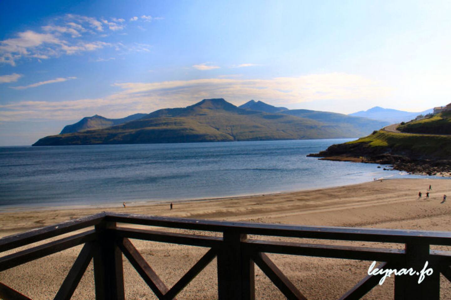 Amazing view from the balcony. Beach in the foreground and Vágar in the background