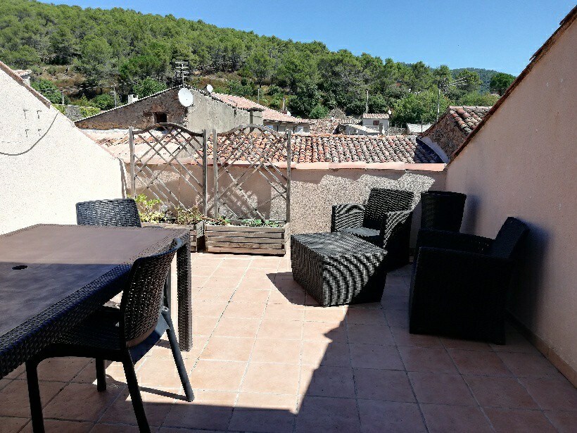 Maison de village avec toit terrasse