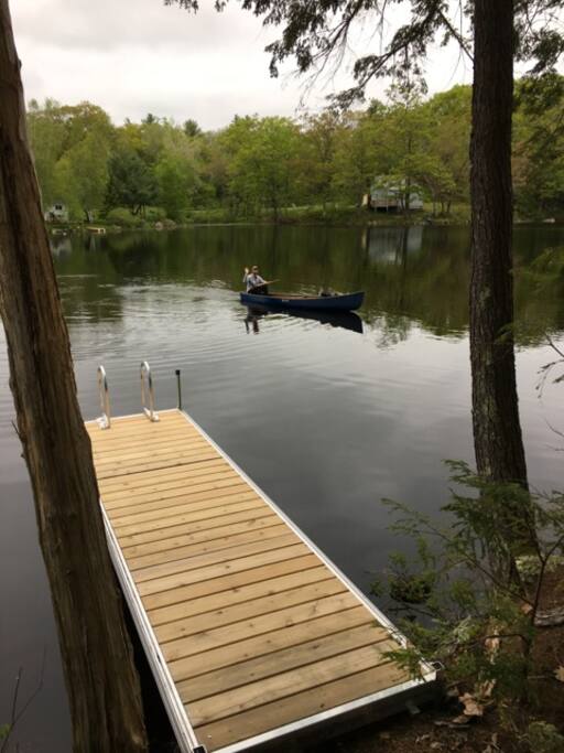 woodsy waterfront with a canoe!