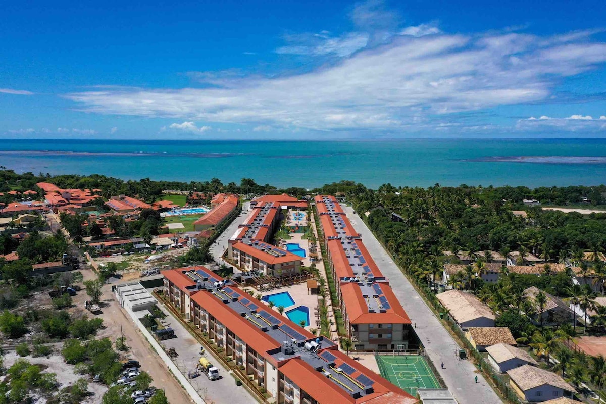Apartamento Resort completo de frente para o mar.