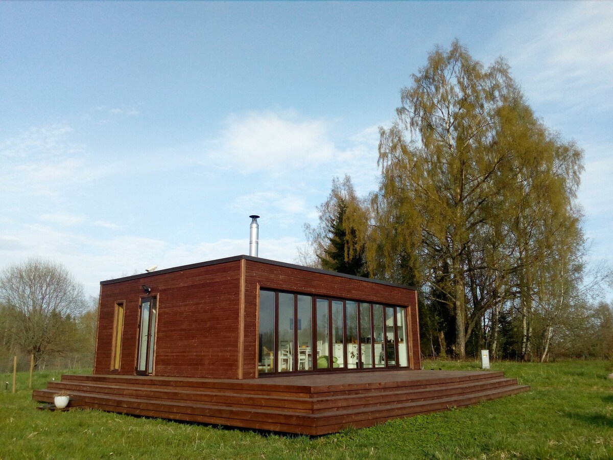 Cosy cabin on a wild meadow