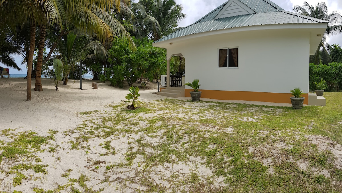 Beachfront villa with sunset view