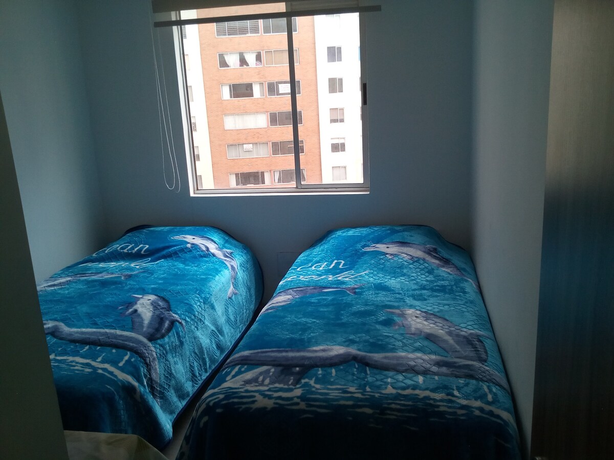 Habitación de Apartamento con 2 camas