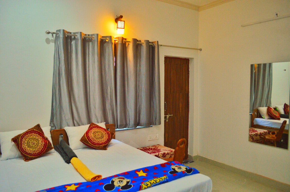 room with balcony near Taj@ Anukampa guest house