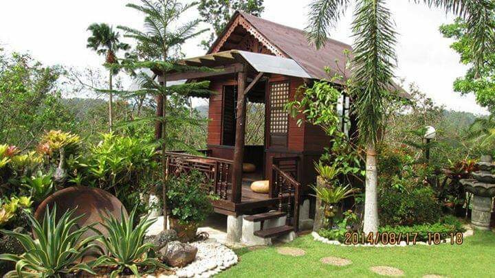 Gen度假村花园。传统Bahay Kubo双人客房