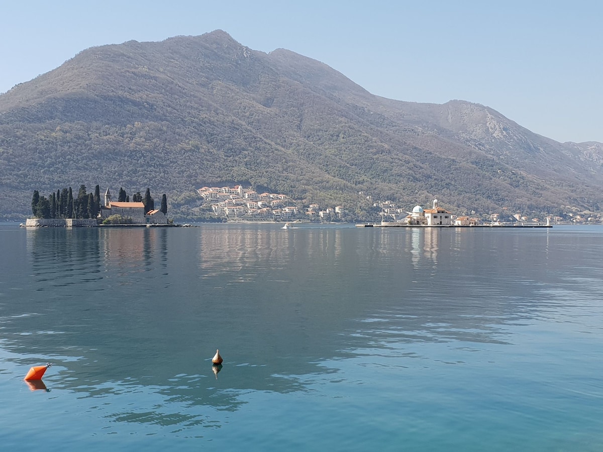 The Gem of Perast on the water's edge in Perast