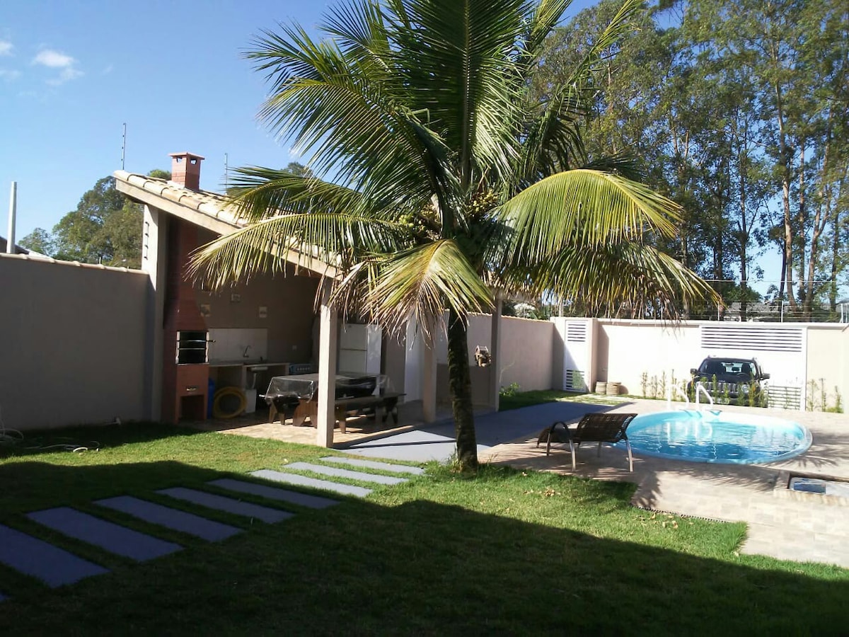 Casa com piscina para curtir com a família-Peruíbe