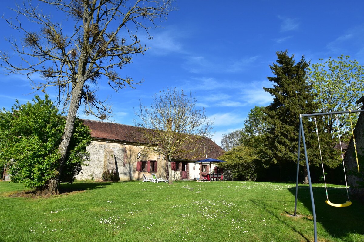 Holiday home with private garden on a farm