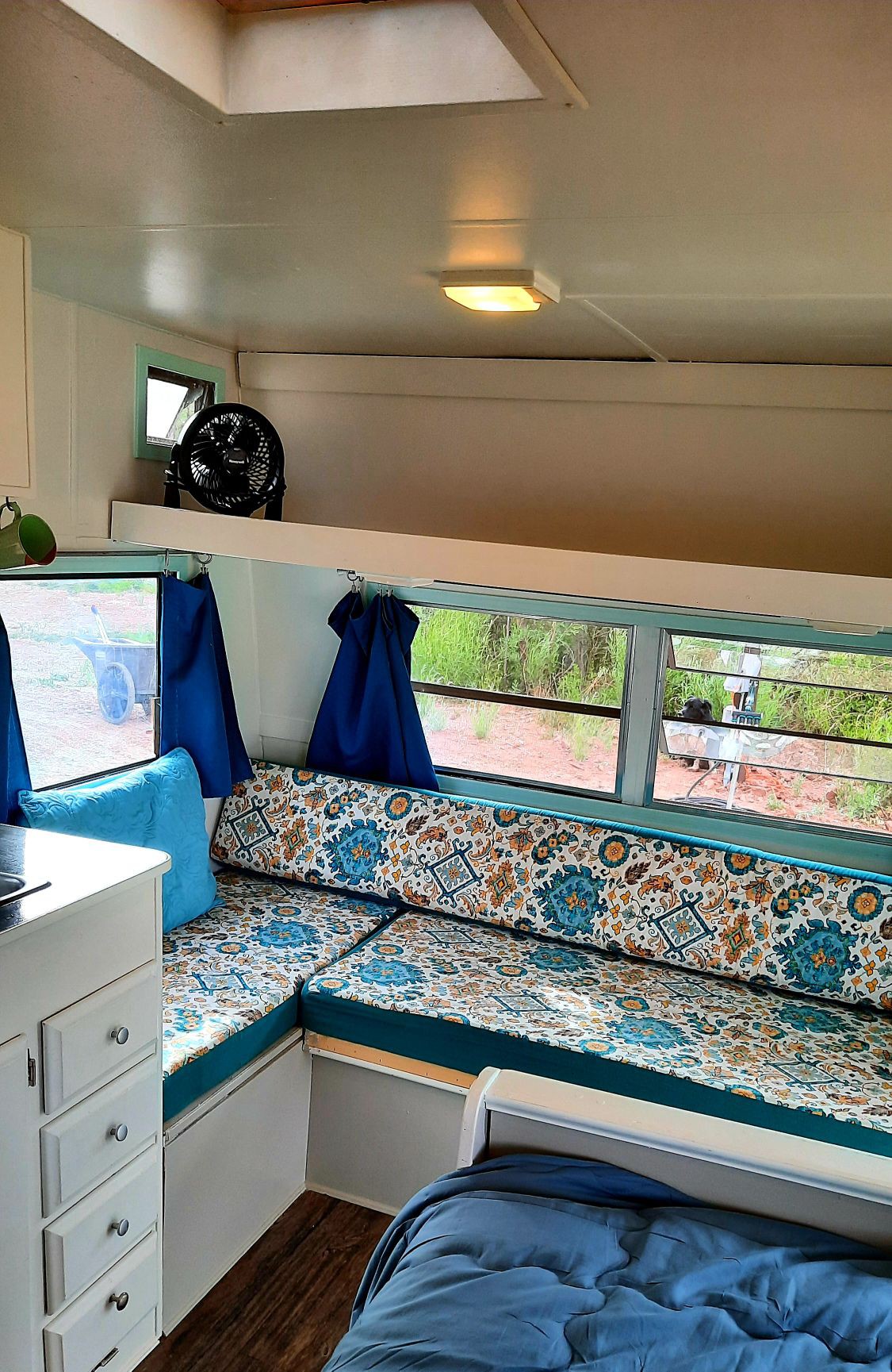 Bluebird, super cute, vintage trailer on the river