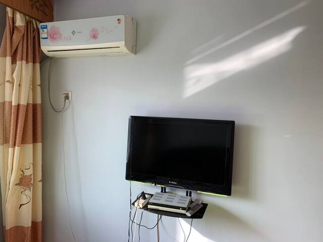 辽阳市弓长岭区温泉滑雪度假村民宿,吕家客舍 - maisons à louer à