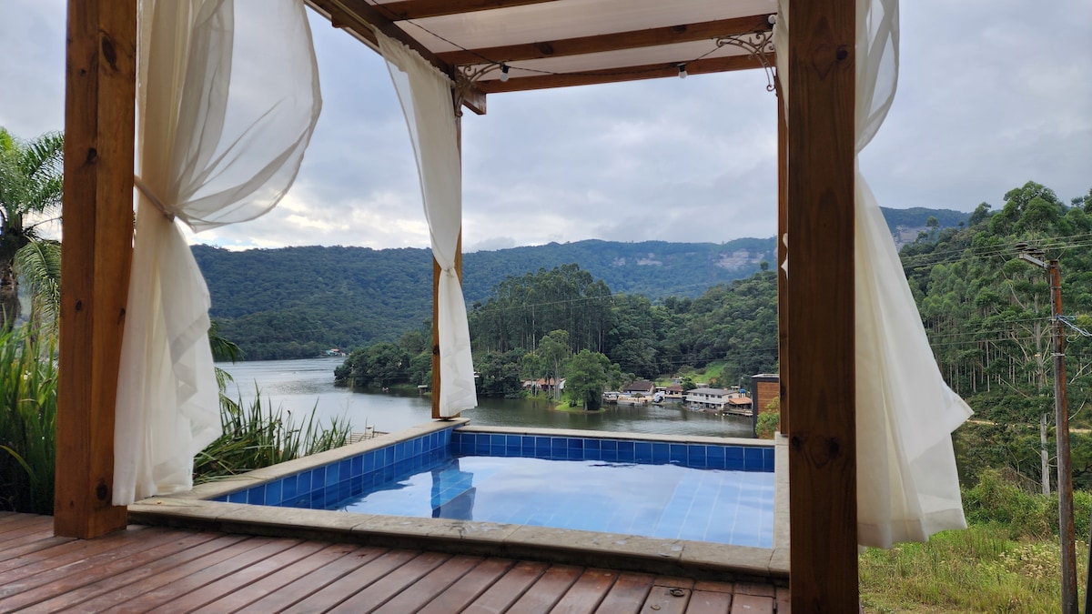 Cabana piscina aquecida, área gourmet, vista lago.