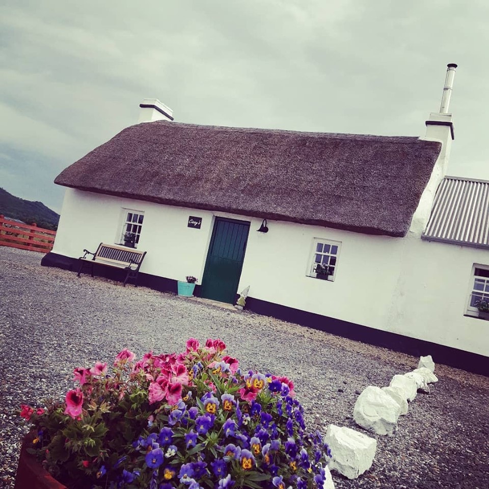 Traditional Irish thatched cottage- near the beach