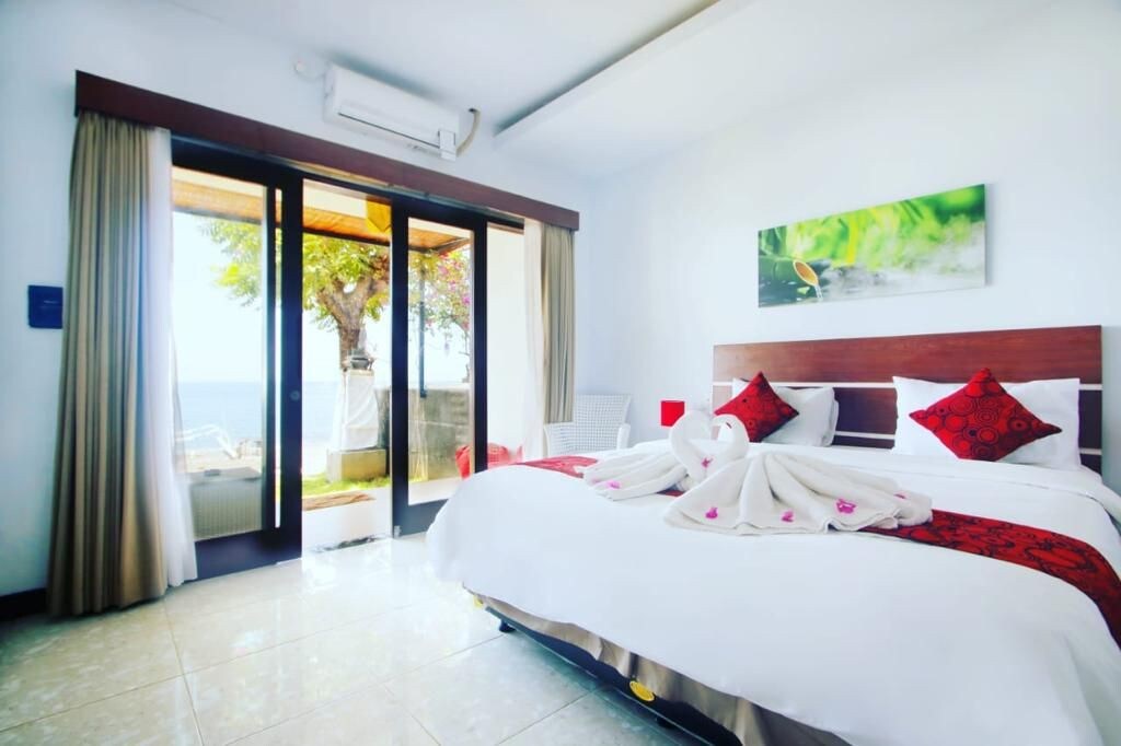 Room by the amed beach view & beautiful sunrise.