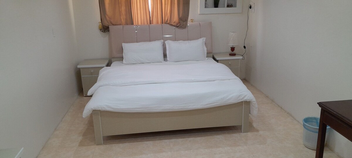 Al Abraj公寓配备家具