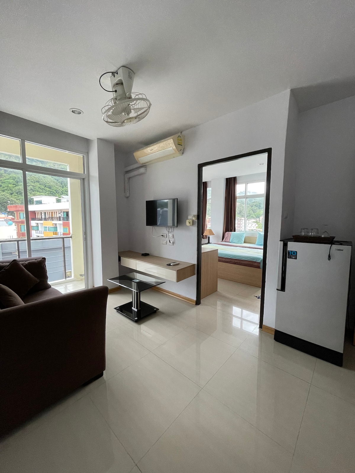 Living room, Kitchenette, Balcony in One Bedroom