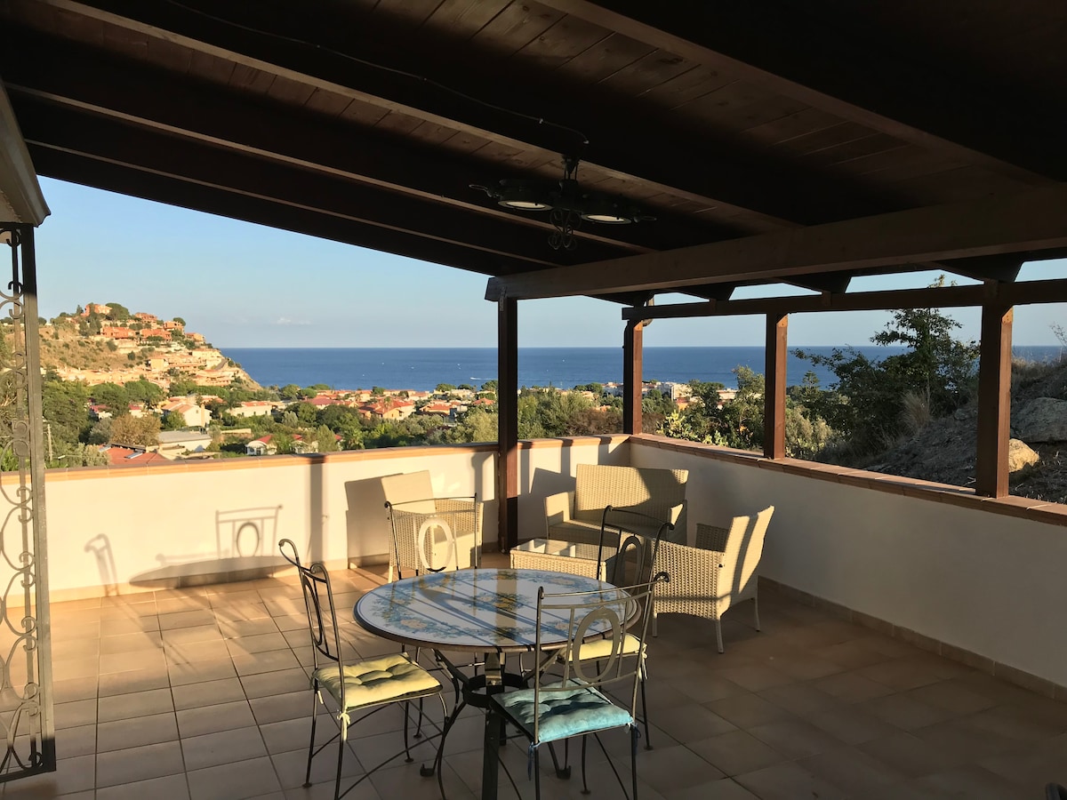 Independent penthouse apartment within a villa