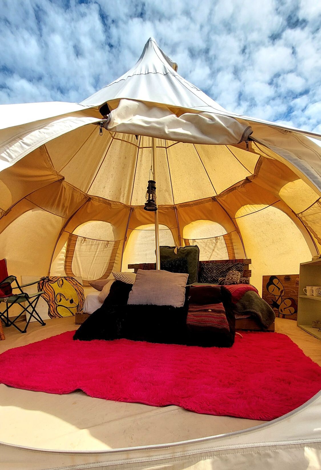 Camping tent with outdoor bathtub on artist's land