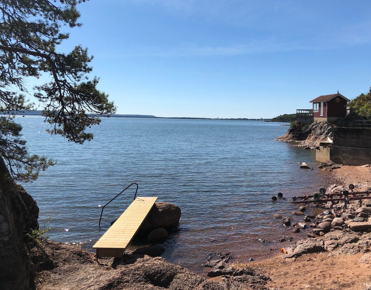 Two lovely cabins by the lake with private beach