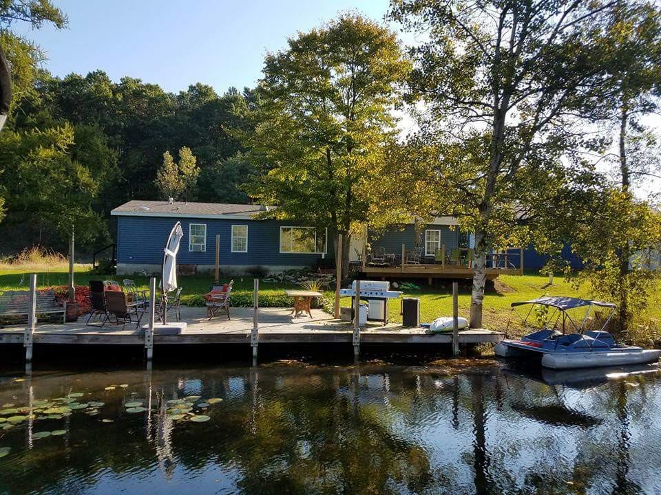 Serene sports lake home.