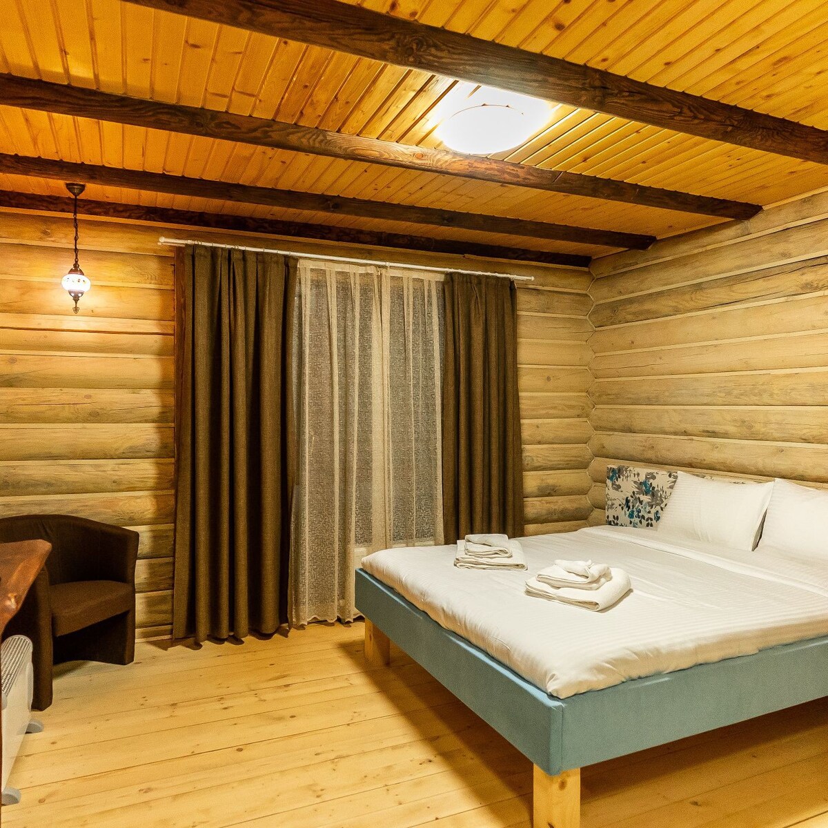 Vlasov生态酒店的舒适房间