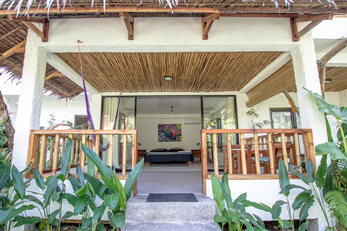 Ack - Bamboo Bungalows Resthouse by White beach