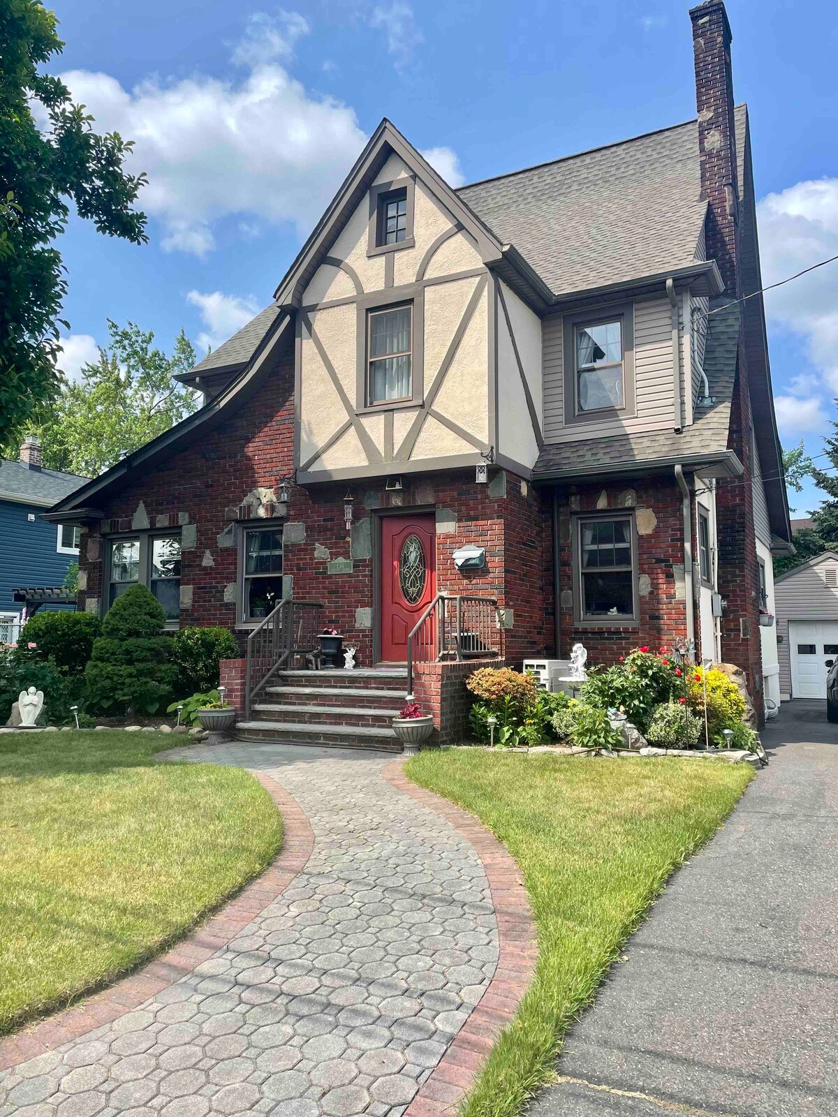 A Cozy Tudor Colonial Residence.