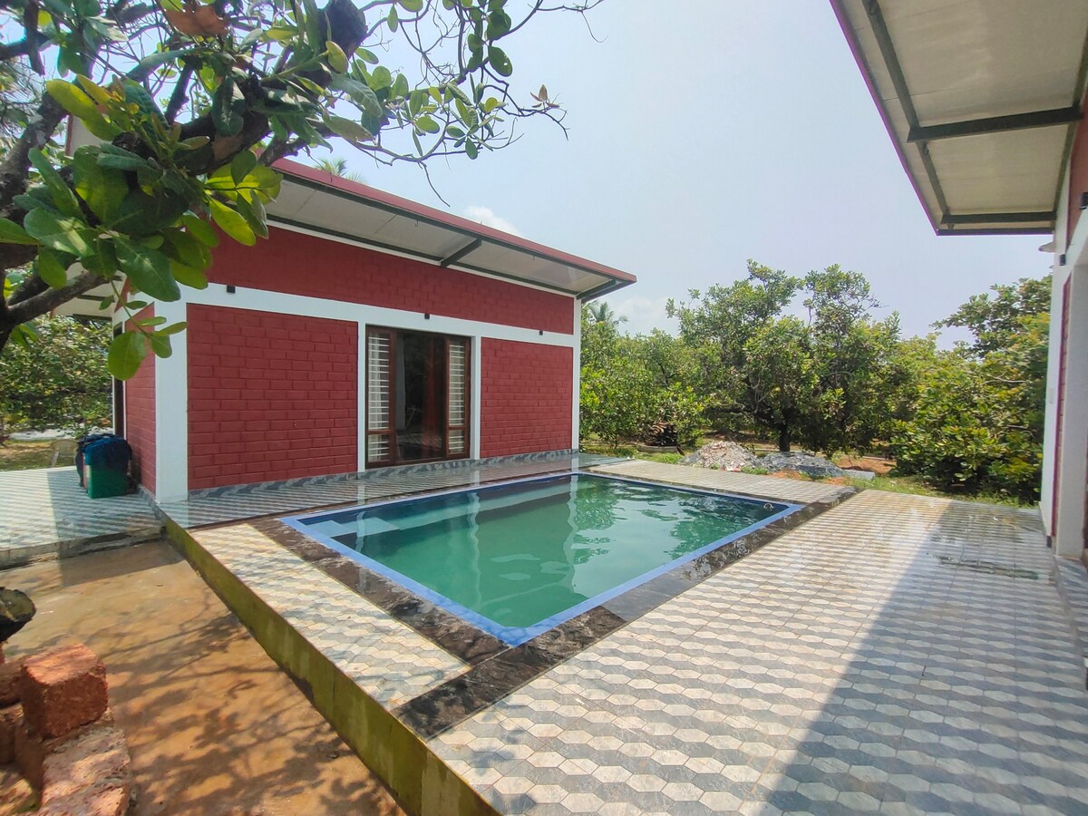 Eco friendly cottage with pool- Kalavady Farmstay