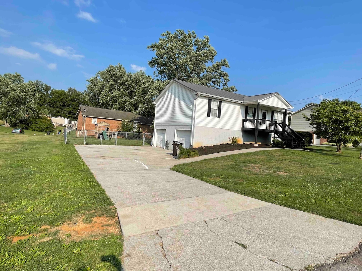 Lakeaway area home with parking and fenced yard.