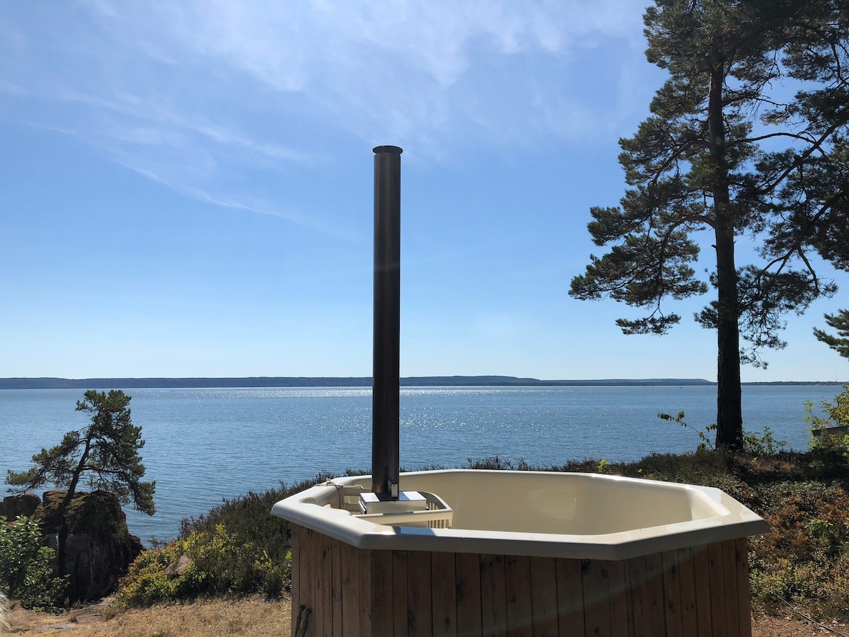 Two lovely cabins by the lake with private beach