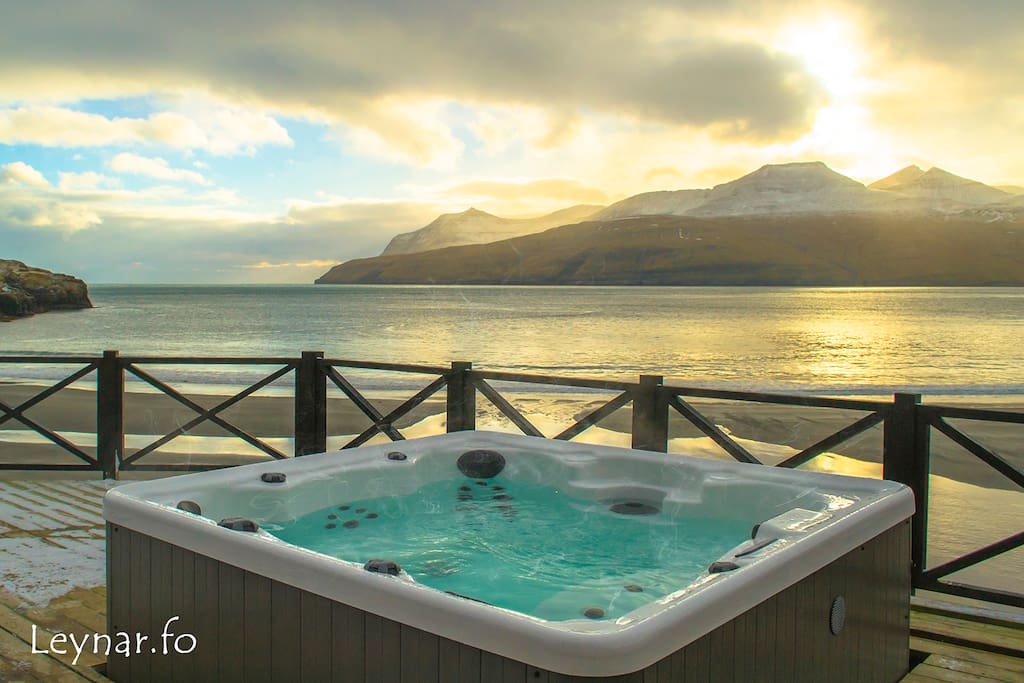 Outdoor hot tub (Jacuzzi) on the terrace, with beautiful ocean view.