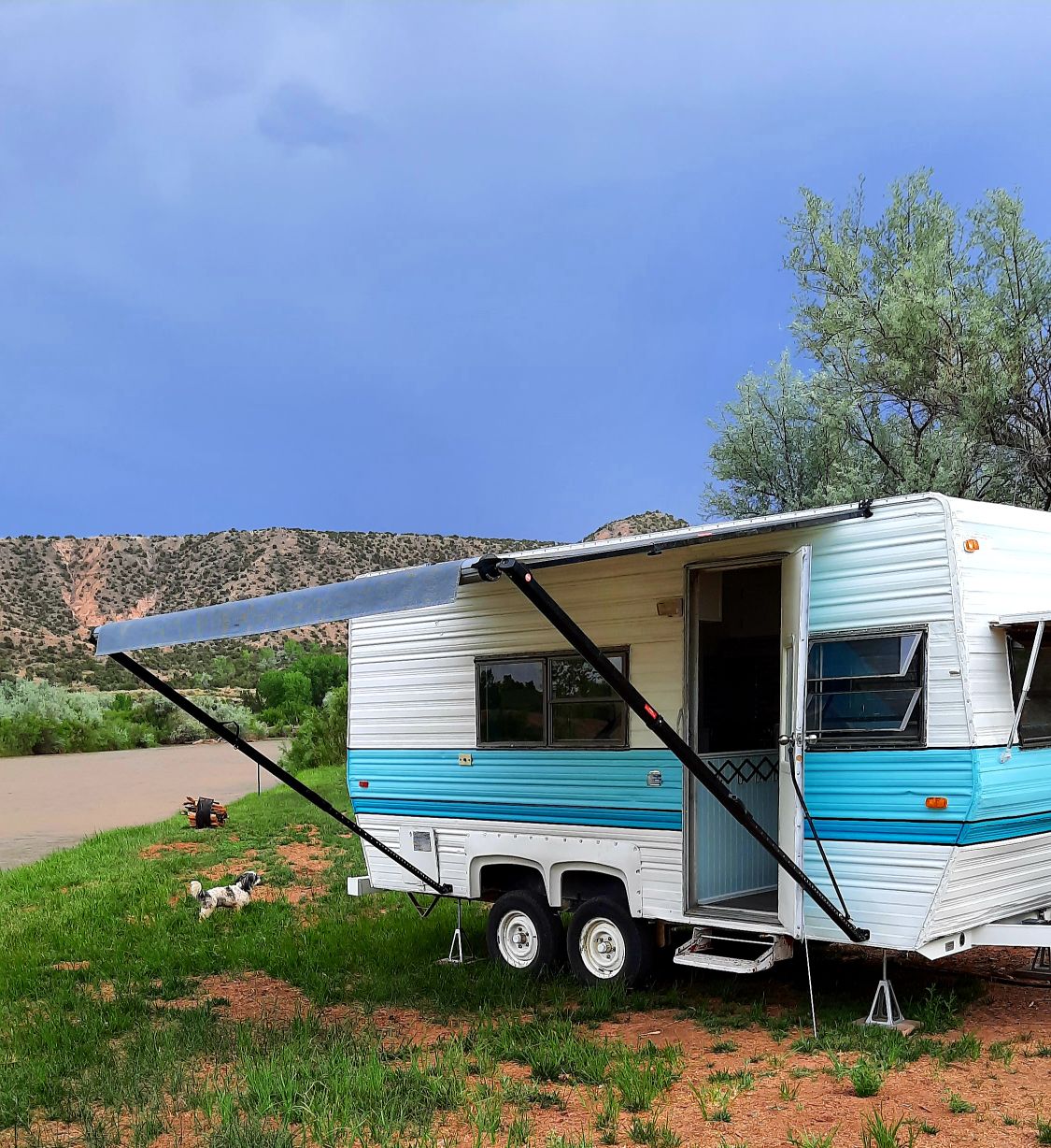 Bluebird, super cute, vintage trailer on the river