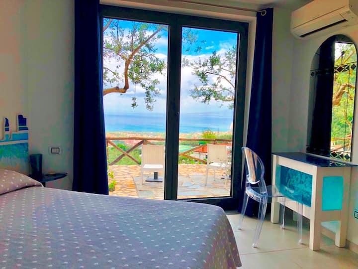 The bed room with a beautiful view of the bay of Naples. enjoy and relax stay at Casa Mazzola Apartment.