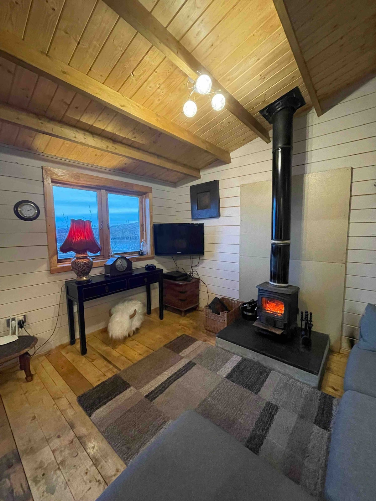 Two bedroom wooden cabin overlooking the Minch