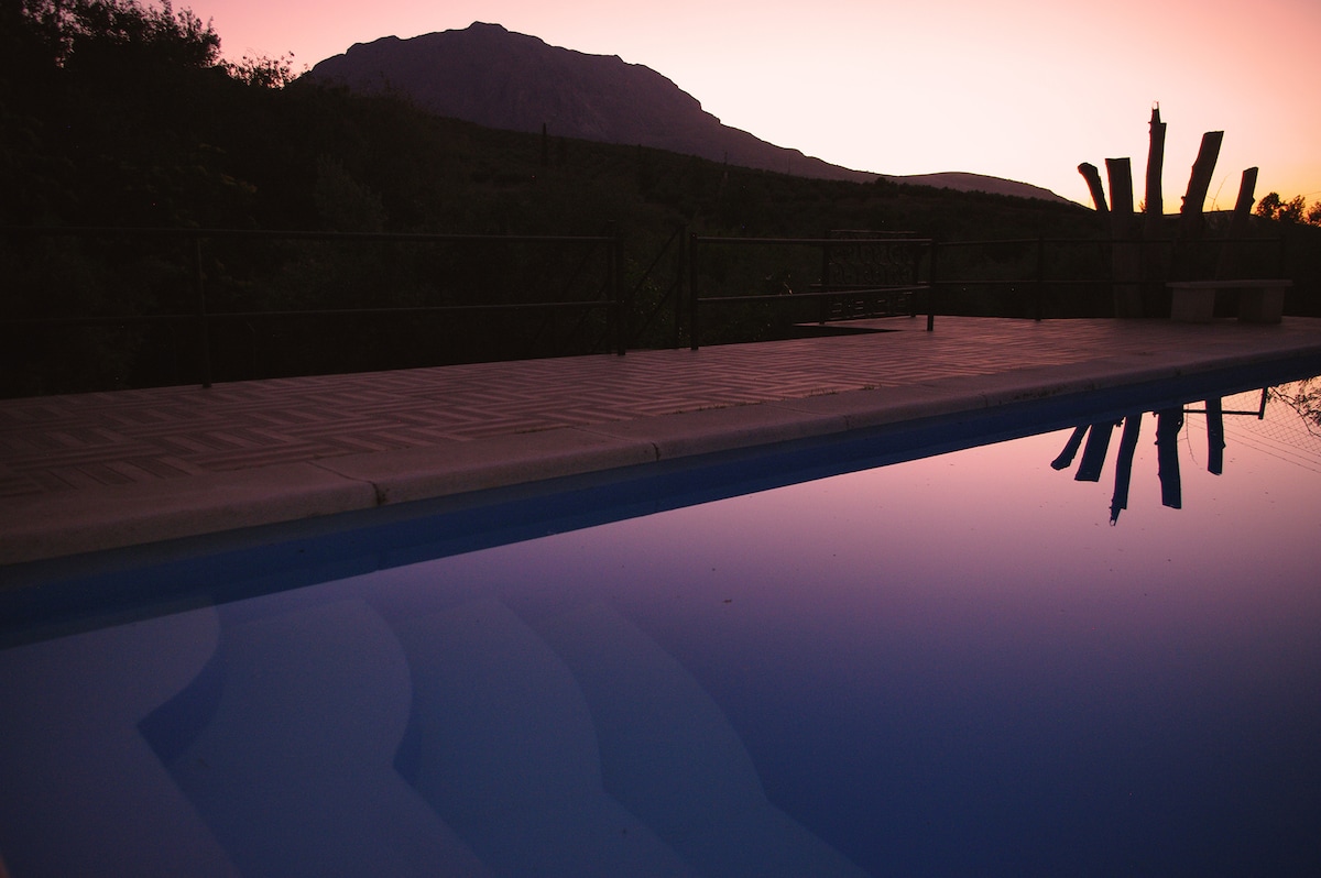 Villa with pool surrounded with mountains views