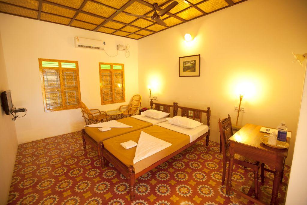 Private room in a village resort at Chettinadu