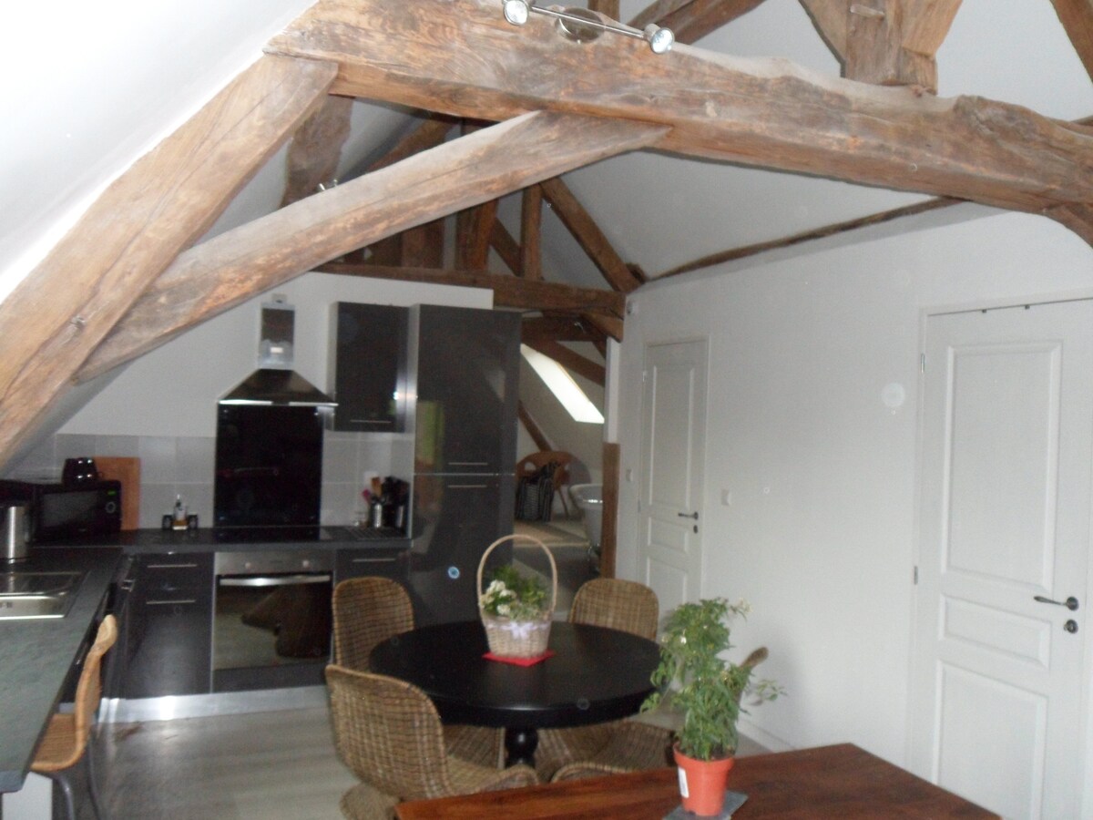 Luxury loft conversion, within a tranquil setting.
