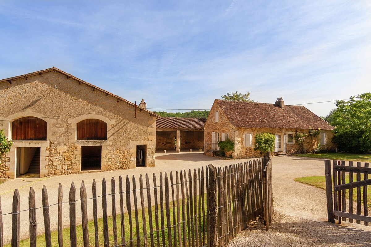 Impressive, restored farmhouse with private pool, surrounded by woods.