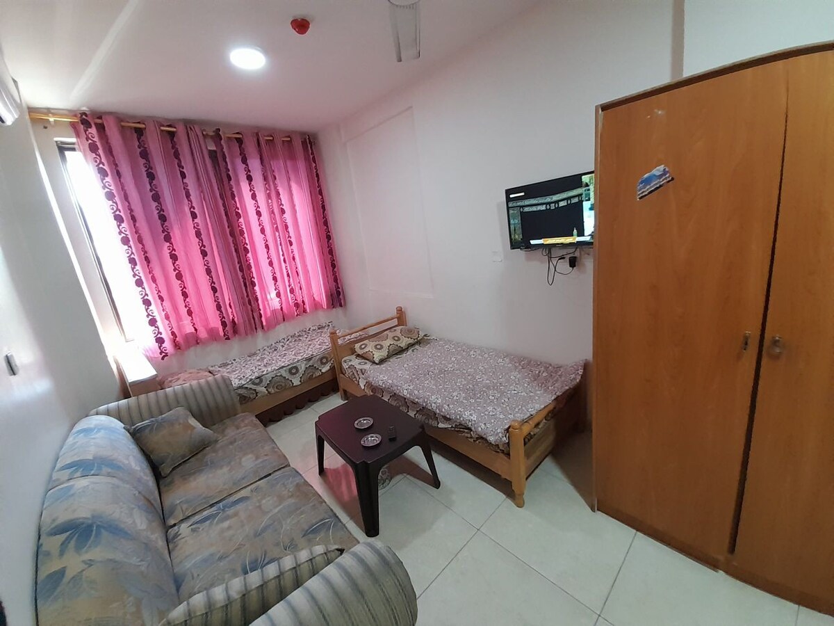 Farah plaza One bedroom with a living room