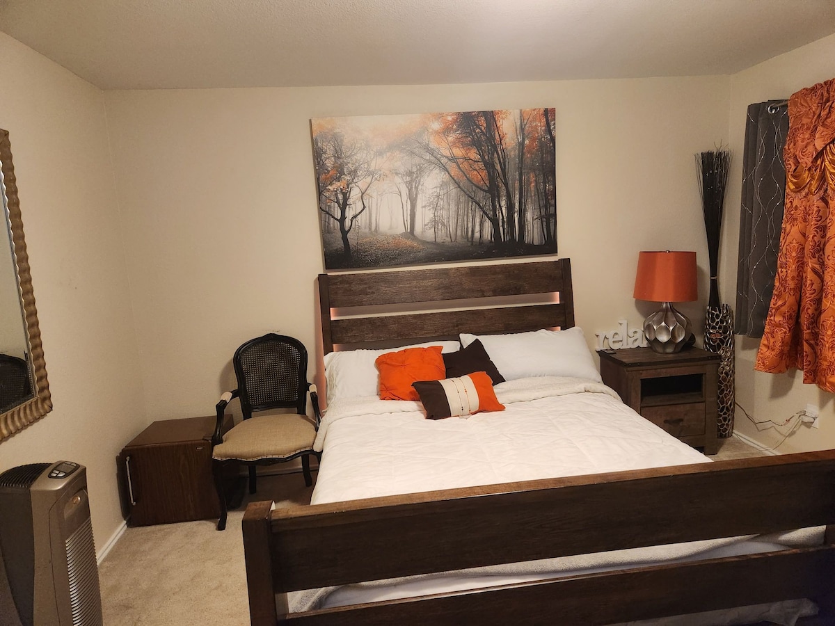 Fully Loaded Orange Room with Shared Bathroom