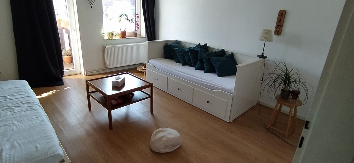 Light bedroom with balcony in center of Hildesheim