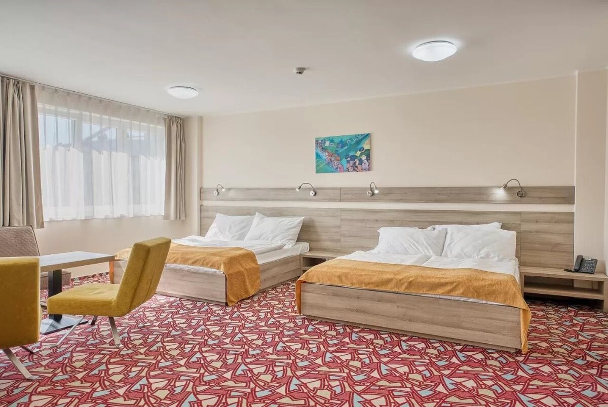 Deluxe pokoj se dvěmi manželskými postelemi