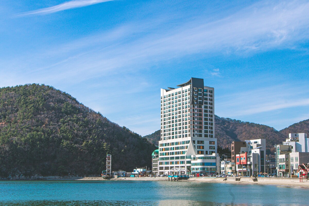 #前面有100%的海景
#新大楼34平海滩1秒
#起居室为
日出。#釜山。