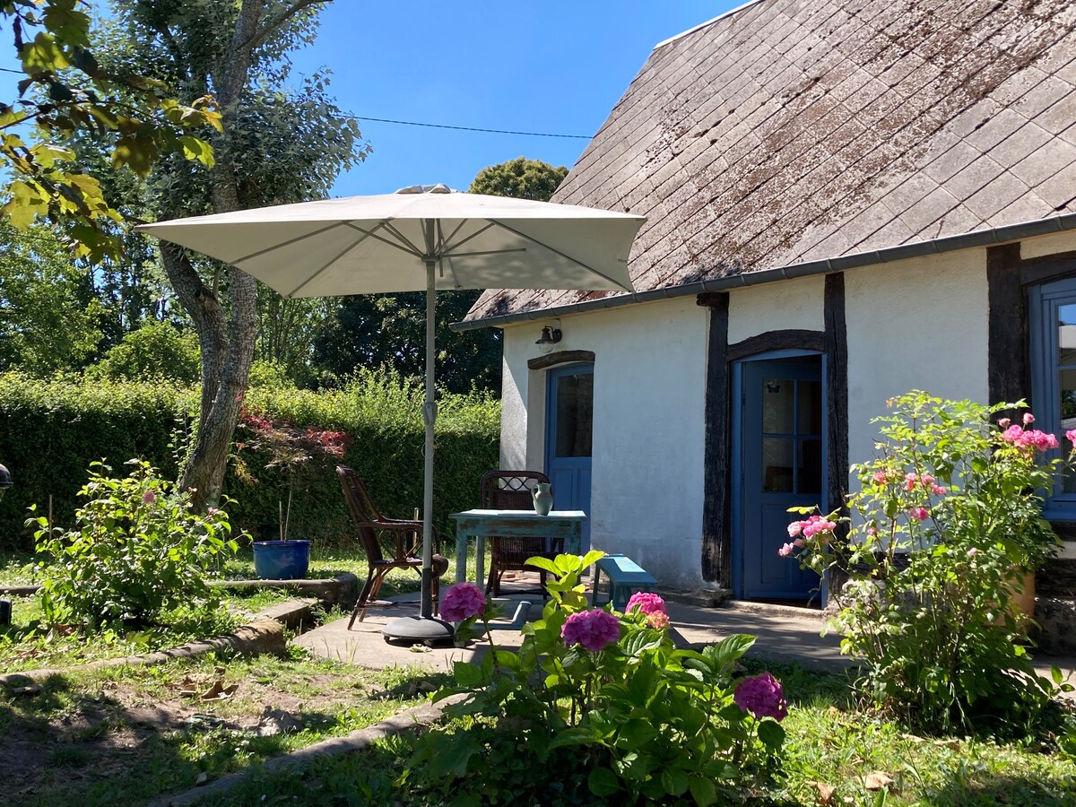 Charmant cottage avec magnifique jardin arboré