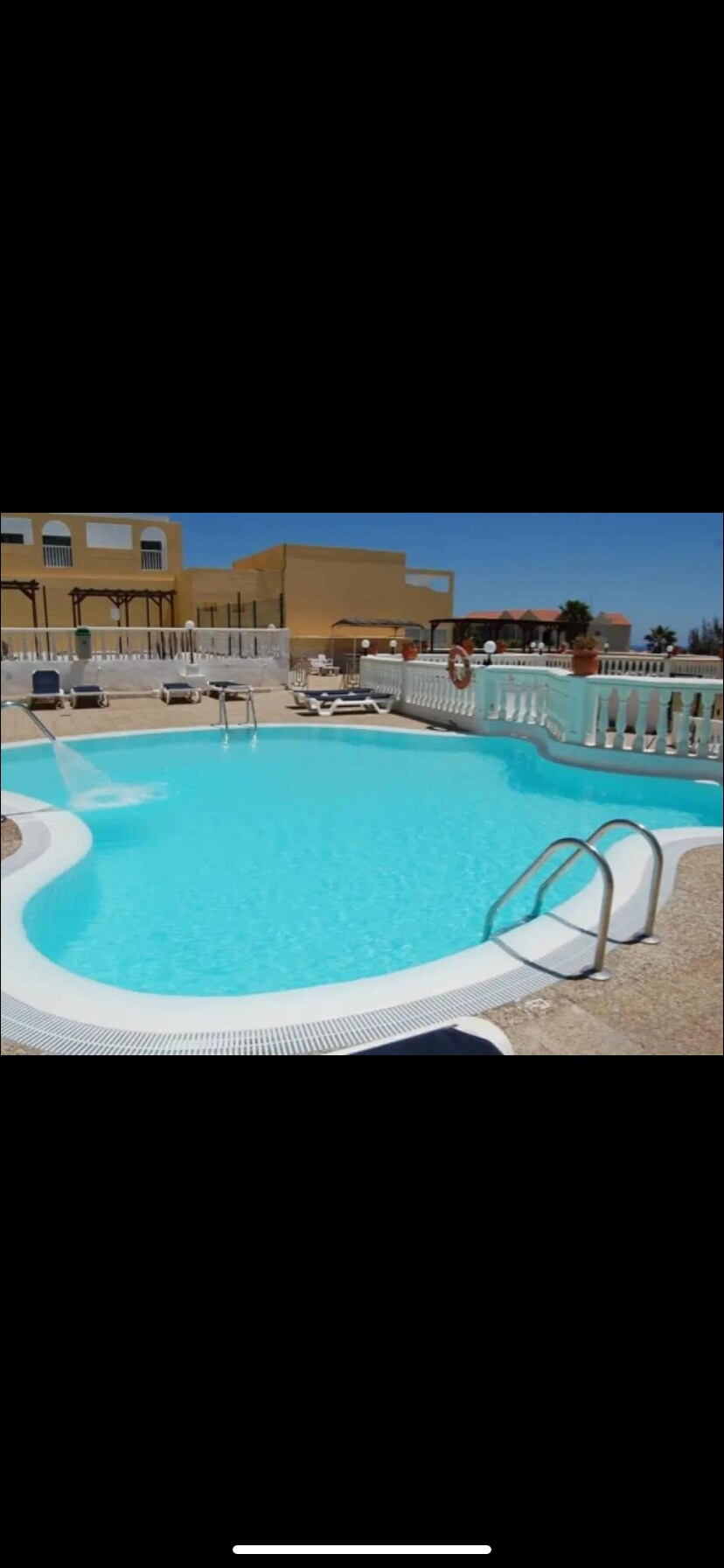 Friendly secure apartment complex with heated pool