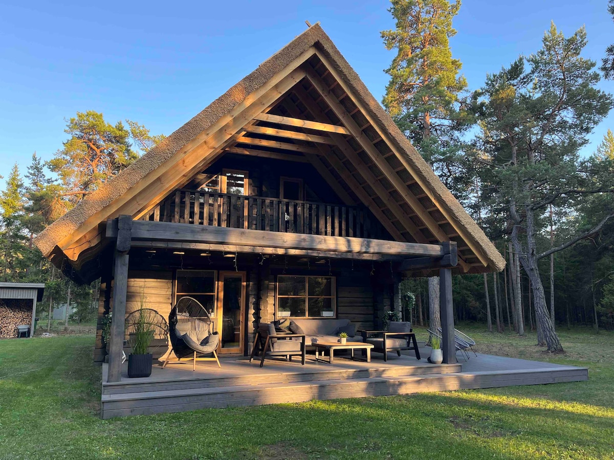 Holiday home with hot tub, lounge area and sauna