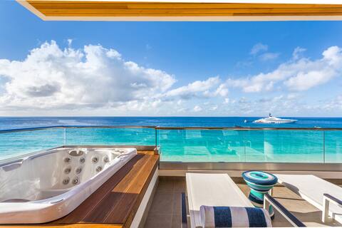 Beachfront 3 Bedroom Luxury Penthouse Resort Condo with Meads Bay's Best Views, Terrace & Hot Tub!