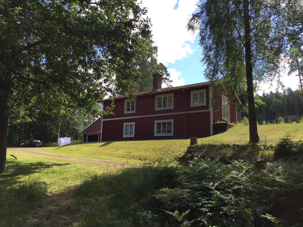 Lovely house on hill next to lake